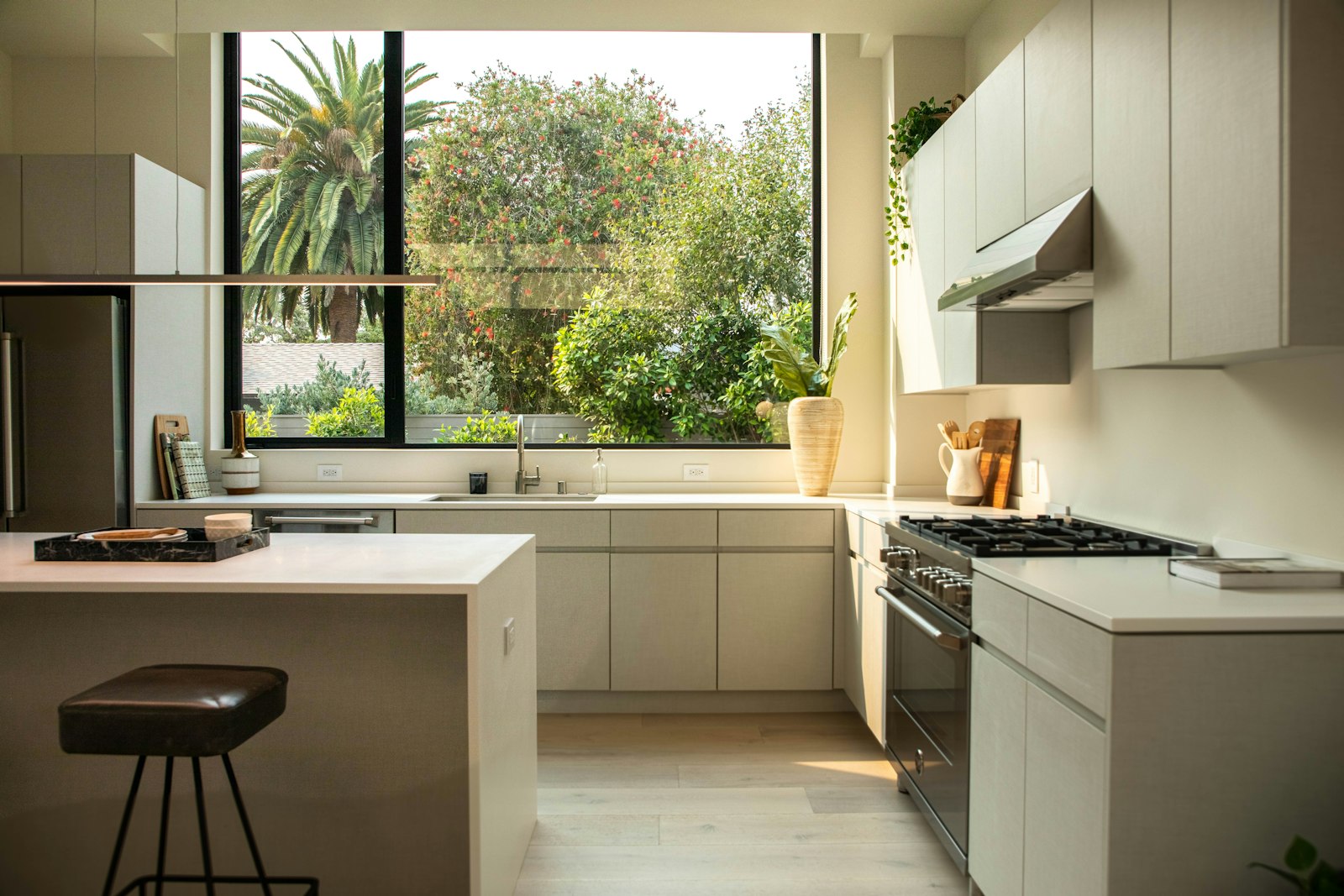 Pale neutral kitchen with garden window